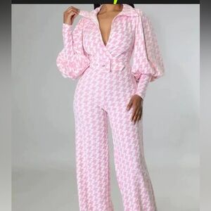 Pink & white houndstooth jumpsuit w/belt. Unworn but boutique hang tag missing